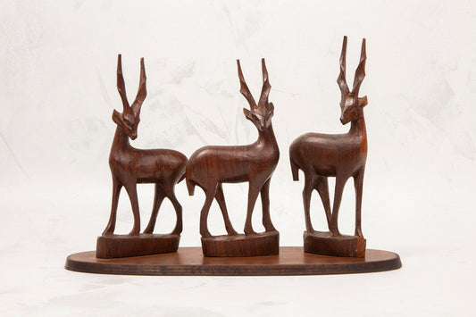 Vintage Hand carved Wooden Stag Figures on stand